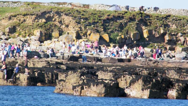 Visitors to Inishmurray Island, Co Sligo. Photo supplied with permission from Keith Clarke
