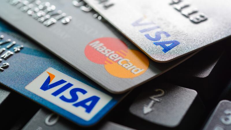 Taking your credit card out of your wallet might help you use it less. Photograph: iStock