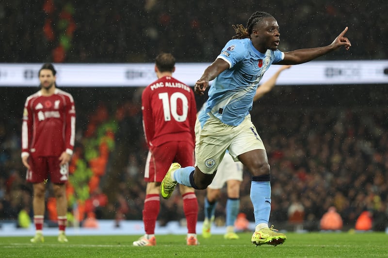 Manchester City's Jeremy Doku celebrates scoring his side's third goal. Photograph: Darren Staples / AFP via Getty Images