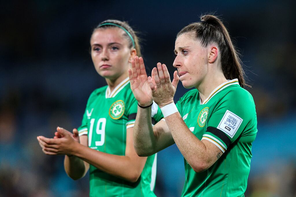 Ireland’s Lucy Quinn and Abbie Larkin after the defeat to Australia at Stadium Australia. Photograph: Ryan Byrne/Inpho