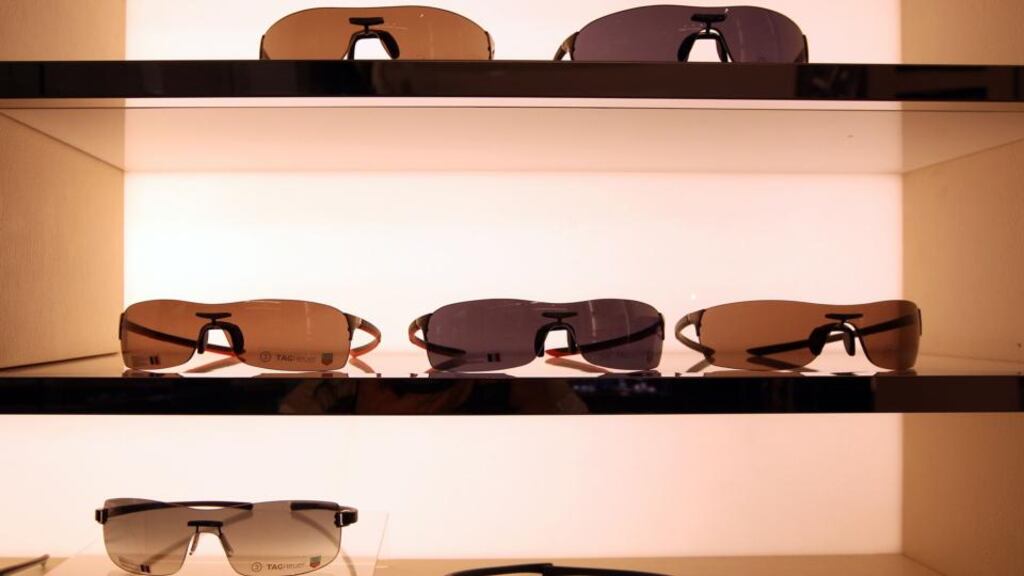 Sunglasses stand on display inside a Tag Heuer store, operated by LVMH , in the Pavilion Mall shopping center in Kuala Lumpur, Malaysia. Asian consumers are more inclined to shop impulsively and pay extra for designer goods than people from other regions, according to a study by market information company Nielsen Holdings NV. Photograph: Goh Seng Chong/Bloomberg