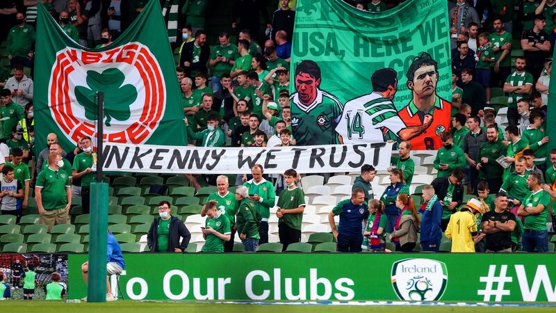 Ireland fans with a sign in support of manager Stephen Kenny. Photo: James Crombie/Inpho