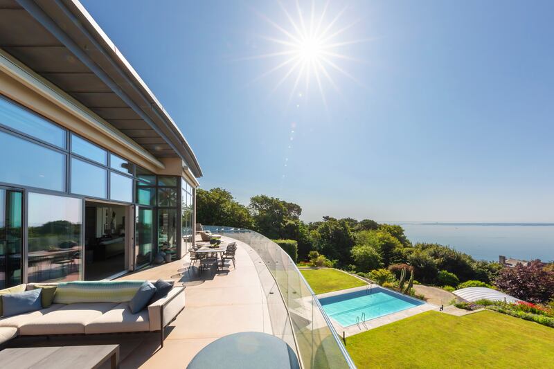 The upper terrace has been extended to give an outdoor dining and living area