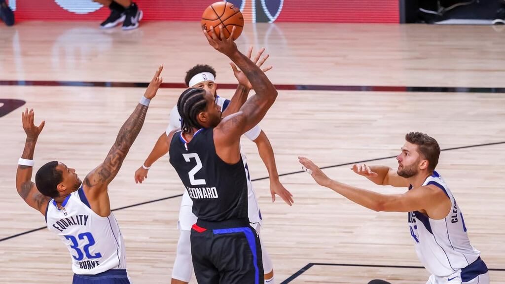 Los Angeles Clippers forward Kawhi Leonard (C) in action against the Dallas Mavericks. Photograph: John G Mabanglo/EPA