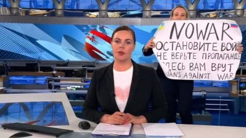 A grab of Marina Ovsyannikova’s protest on Channel One. Photograph: Handout/AFP via Getty Images)