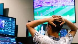 Elderly punter helps staff foil three-man armed raid on bookie’s