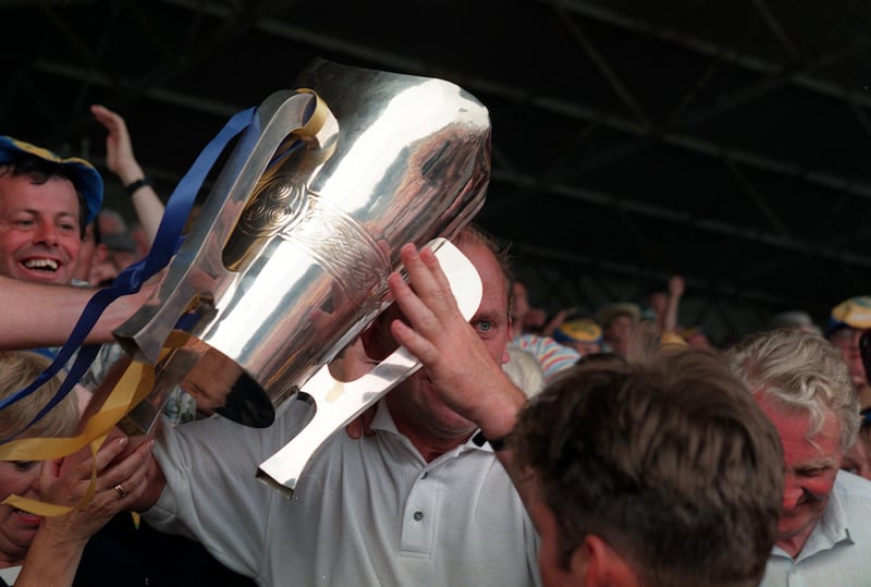 Manager Ger Loughnane with the cup after Clare's breakthrough Munster hurling final win over Limerick in 1995. Photograph: Tom Honan/Inpho