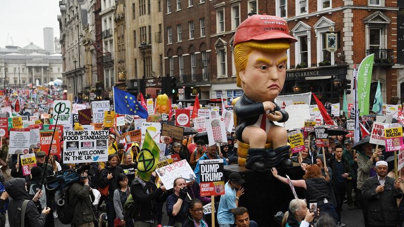 People march down Whitehall during an anti-Trump protest. Photograph: Andy Rain/EPA