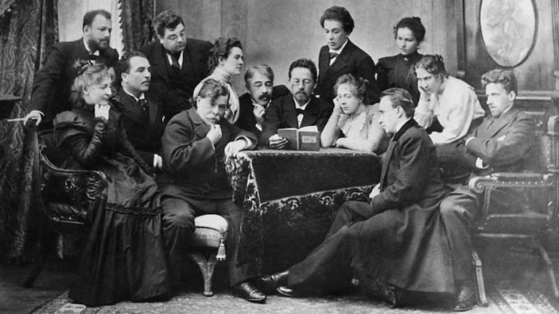 Anton Chekhov reads his play, The Seagull, to actors. Chekhov’s desk faced the wall, soaked in sunlight. From here he embraced both of his callings: medical and artistic, Photograph: Sovfoto/UIG via Getty Images