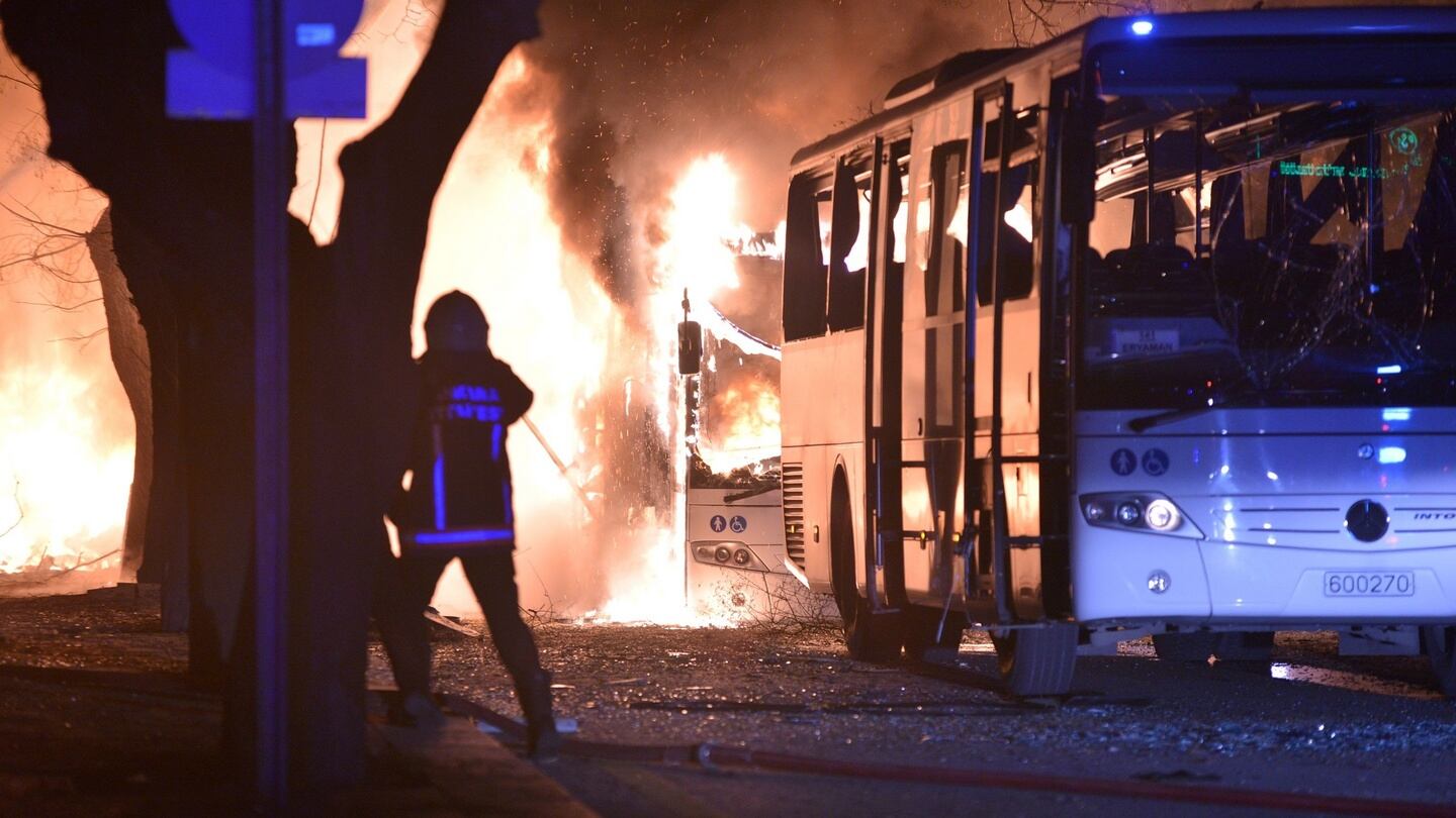 Firefighters try to extinguish flames following an explosion after an attack targeted a convoy of military service vehicles in Ankara, Turkey. Photograph: AFP/Getty Images