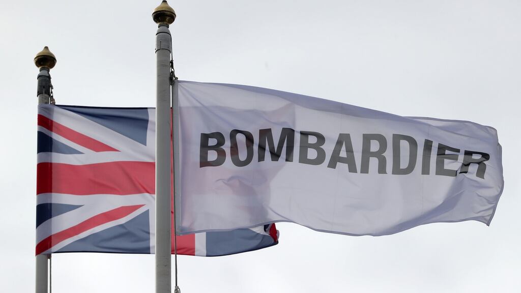 Flags fly above the Bombardier Aerospace plant in Belfast. The Canadian group has announced plans to sell the Northern Ireland business. Photograph: Niall Carson /PA Wire