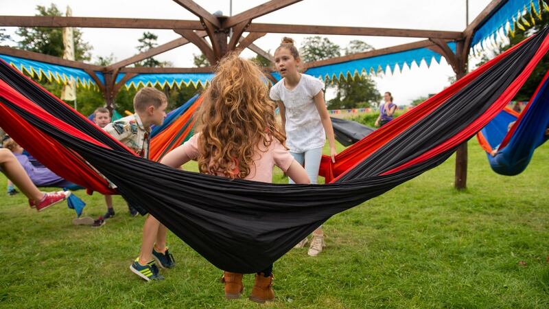 Chilling on some hammocks. Festivals are more child-friendly than ever.