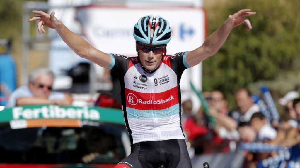 US rider Chris Horner (RadioShack) celebrates as he crosses the finish line to claim the 10th stage of the Tour of Spain, between Torredelcampo and Alto de Hazallanas. Photograph: Jose Jordan/AFP/Getty Images)