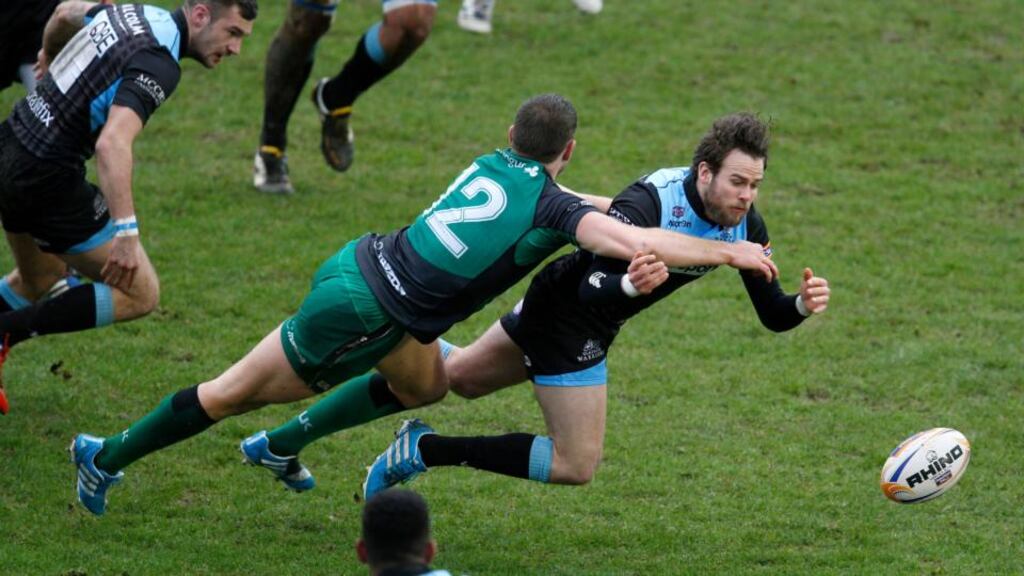 Connacht’s Craig Ronaldson tackles Warriors’ Ruaridh Jackson at Scotstoun. Photograph: Russell Cheyne/Inpho