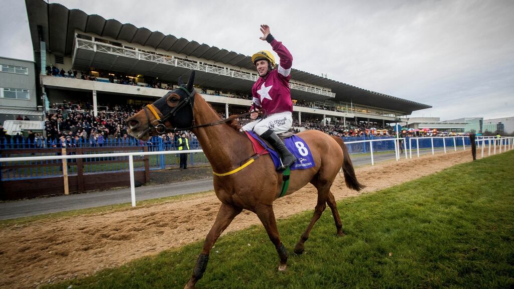 Sean Flanagan celebrates victory on board Road to Respect in the   Leopardstown Christmas Steeplechase. Photograph: Ryan Byrne/Inpho