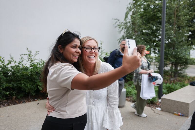 Jennifer Murray, who came to the aid of the Indian man attacked in Tallaght, meets other attendees at the protest. Photograph: Dan Dennison