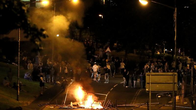 The scene on Fahan street in Derry on Thursday night as disorder flared in the city for a sixth successive night following an Orange Order parade as part of the annual Twelfth of July celebrations. Photograph: Brian Lawless/PA Wire.