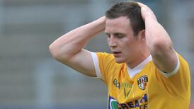 Michael McCann departs the Antrim football squad