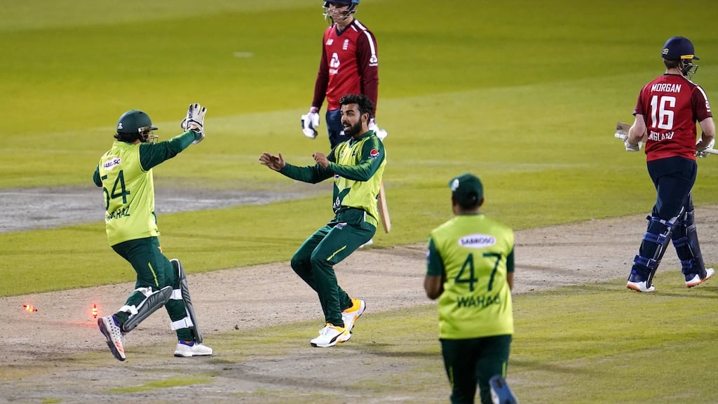Pakistan celebrate the running out of England captain Eoin Morgan during the third T20 international at Old Trafford. Photograph: Jon Super/PA Wire