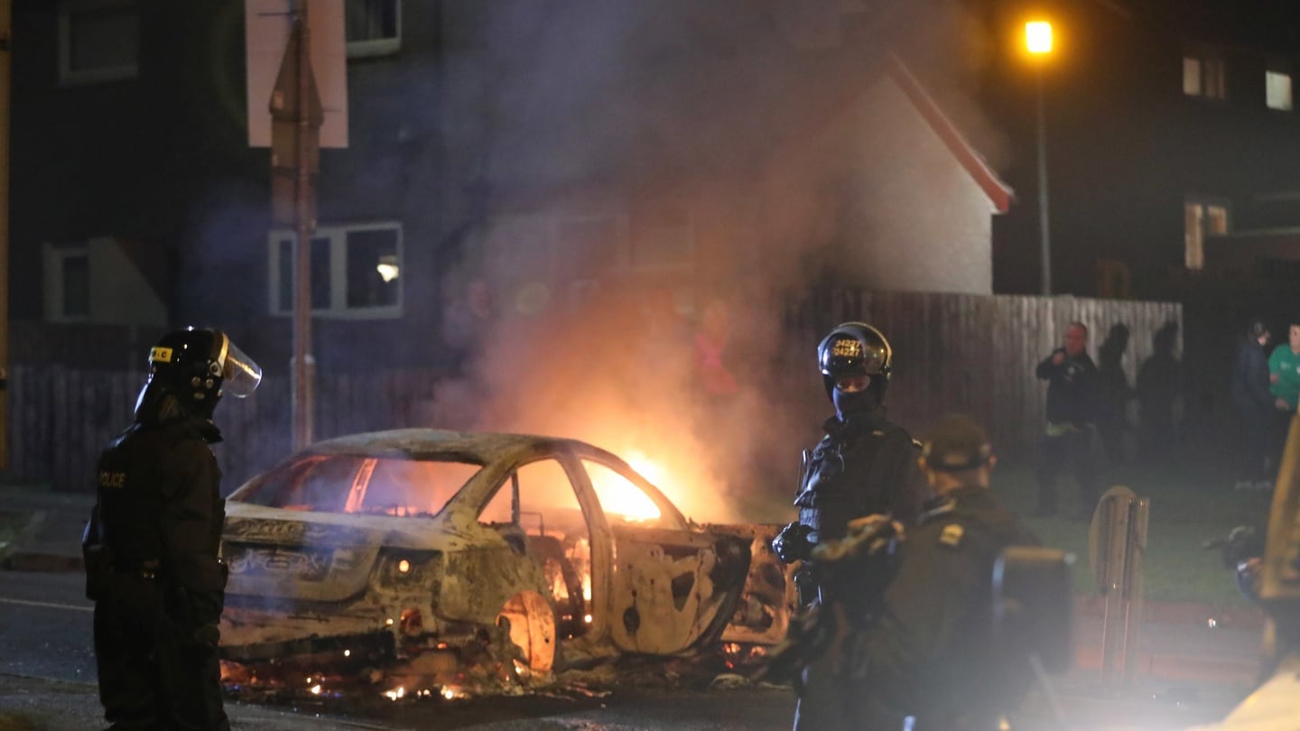 Armed officers in Derry after shots were fired and petrol bombs were thrown at police. Photograph: PA