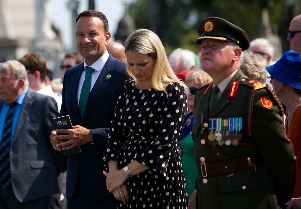 Tanaiste Leo Varadkar, the Minister for Justice Helen McEntee and deputy chief-of-staff Major General Anthony McKenna at
the Collins/Griffith commemoration at Glasnevin Cemetery, Dublin. Photograph: Gareth Chaney/ Collins Photos