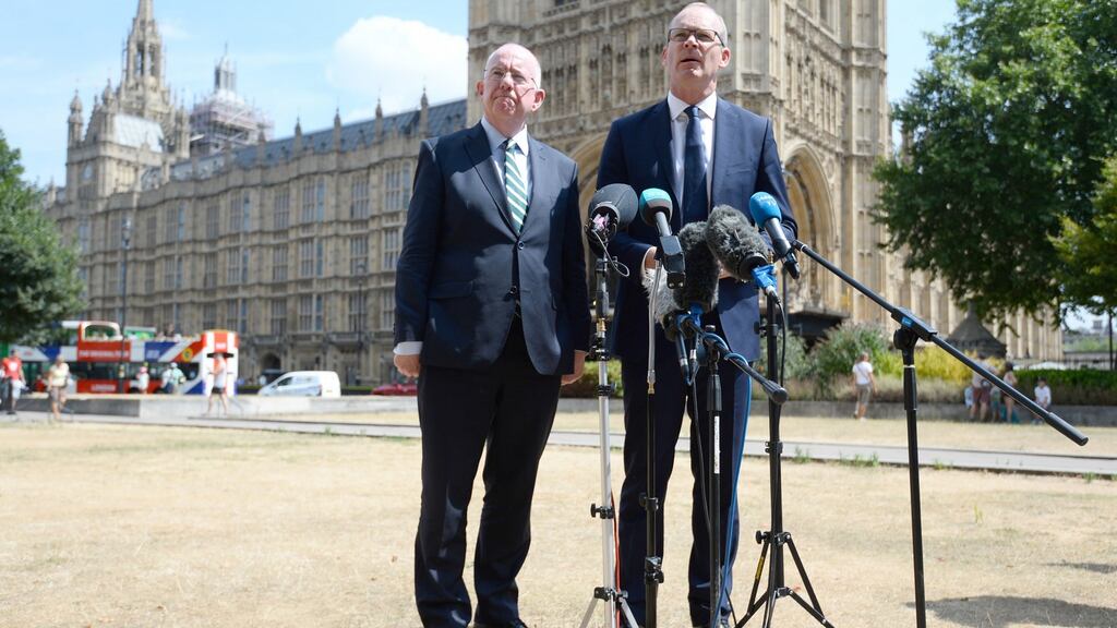 Minister for Justice Charlie Flanagan and Minister for Foreign Affairs Simon Coveney during a press conference on College Green in London, following a meeting of the British-Irish Intergovernmental Conference. Photograph: Kirsty O’Connor/PA Wire