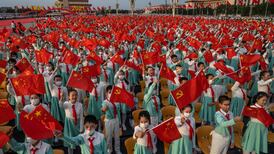 EY staff in China encouraged to wear Communist Party badges