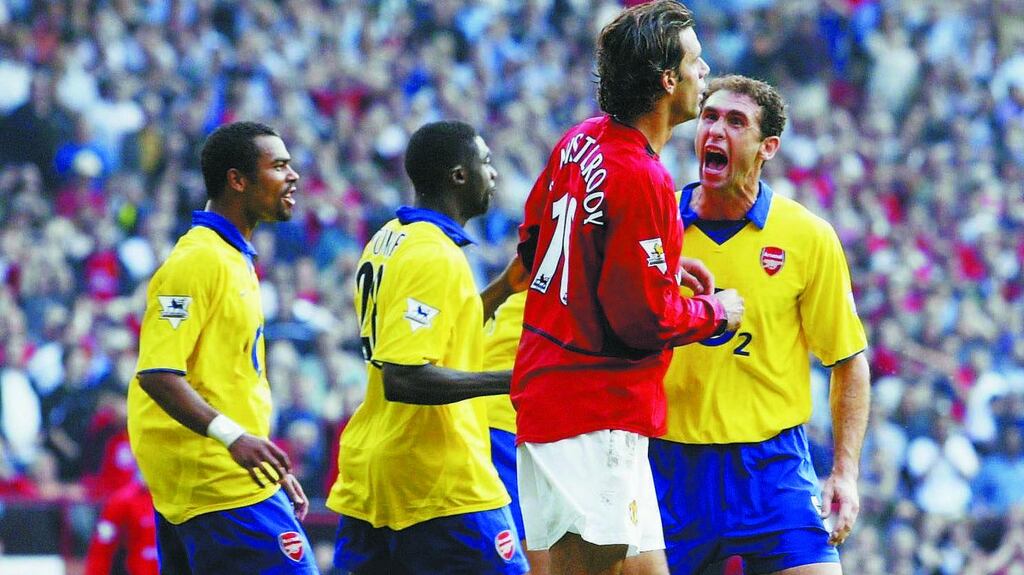 Martin Keown of Arsenal goads Ruud Van Nistelrooy of Man Utd after Van Nistelrooy missed his penalty at Old Trafford in 2003. Photo: Shaun Botterill/Getty Images