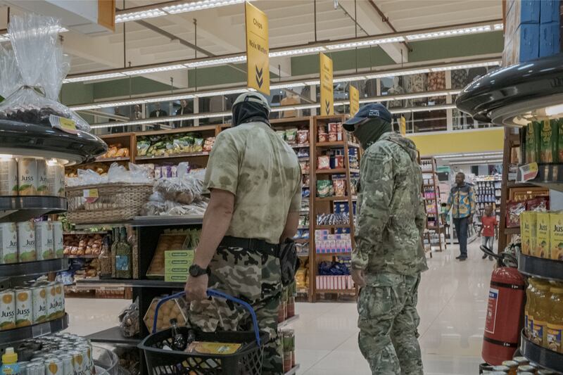 Russian mercenaries shop at Bangui Mall, a supermarket used mostly by embassy staff and non-governmental organisations in Bangui, the Central African Republic’s capital. Photograph: Mauricio Lima/New York Times