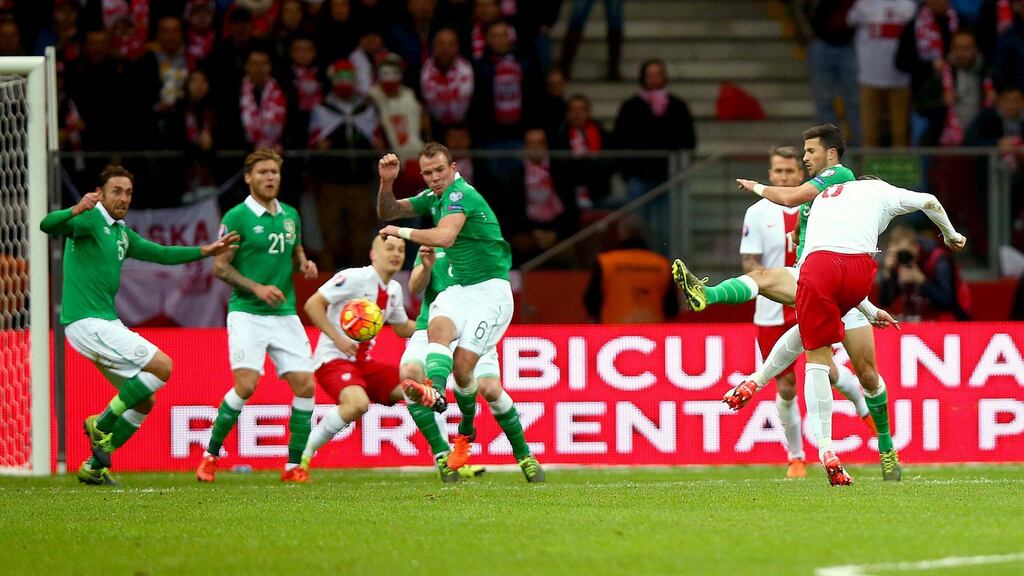 Poland’s Gregorz Krychowiak scores their first goal. Photo: Donall Farmer/Inpho