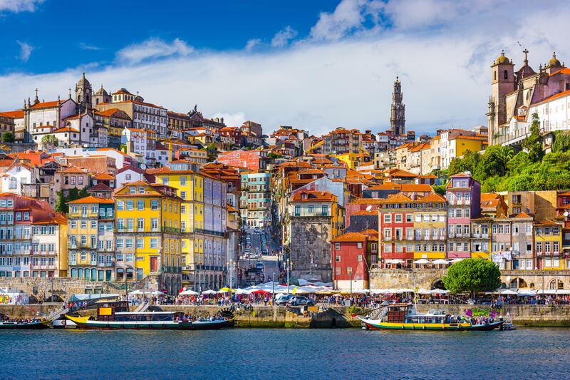The old town skyline of Porto, Portugal from across the Douro River. Photograph: Sean Pavone/Getty Images