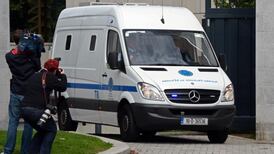 Grin from Dundon as he is led off to begin life sentence