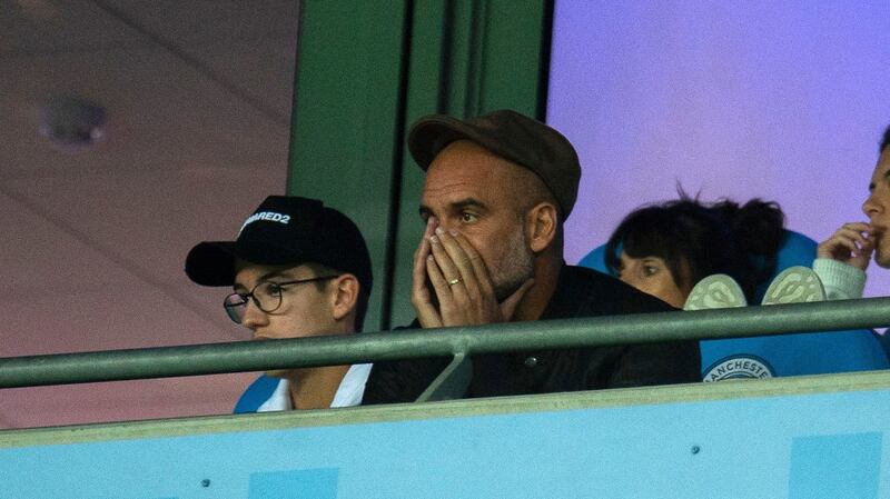 Manchester City manager Pep Guardiola reacts in the stands during the Champions League Group F match against Lyon at the Etihad Stadium. Photograph: Peter Powell/EPA