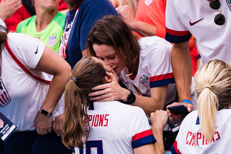 Kelley O'Hara of the United States kisses her girlfriend during the 2019 FIFA Women's World Cup final against The Netherlands. Photograph: Marcio Machado/Getty Images