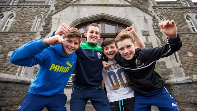 Cistercian College students Niall O’Sullivan, Co Tipperary, Peter Collins, Co Tipperary, John Nolan, Co Laois and Calum MacEntire, Co Longford celebrate the news that their school is to remain open. Photograph: Oisin McHugh