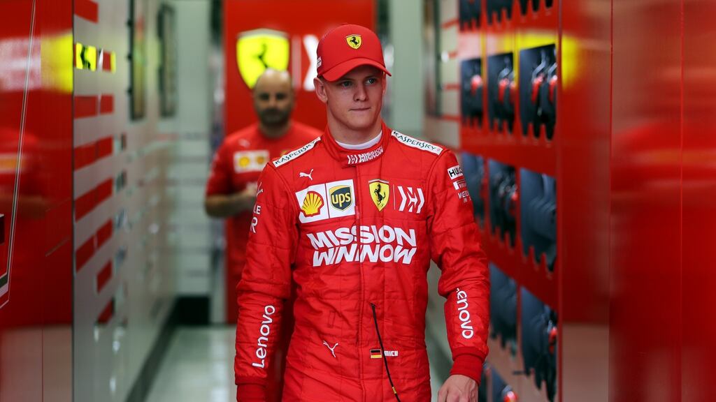 Mick Schumacher walks out of the Ferrari garage during testing at the Bahrain International Circuit. Photograph: Hamad I Mohammed/Reuters