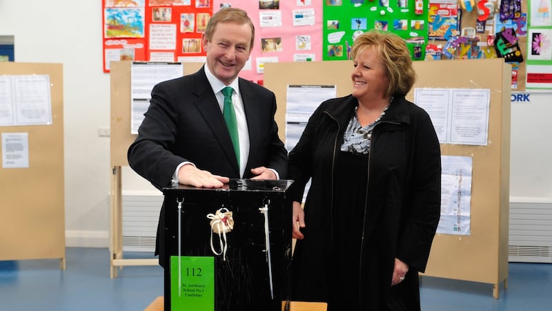 Taoiseach Enda Kenny and his wife Fionnuala cast their votes in Castlebar. Photograph: Aidan Crawley/Bloomberg