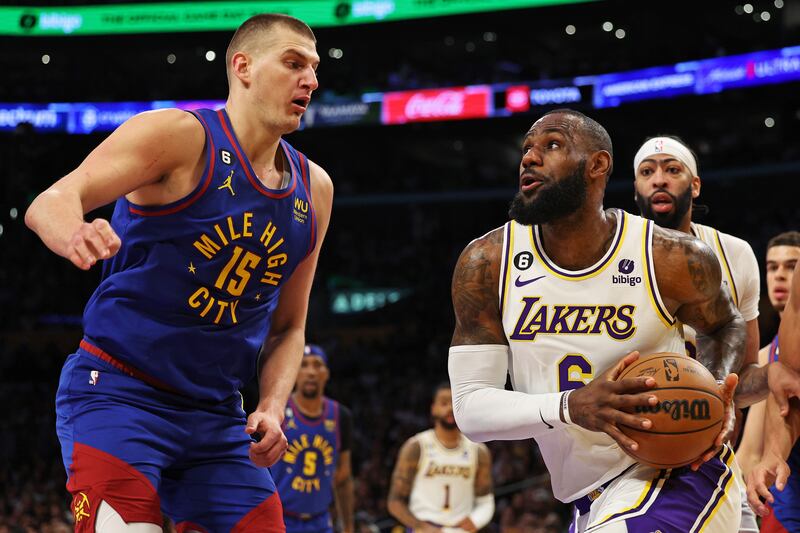 LeBron James of the Los Angeles Lakers drives to the basket against Nikola Jokic of the Denver Nuggets during the first quarter in game three of the Western Conference Finals at Crypto.com Arena in Los Angeles. Photograph: Harry How/Getty Images