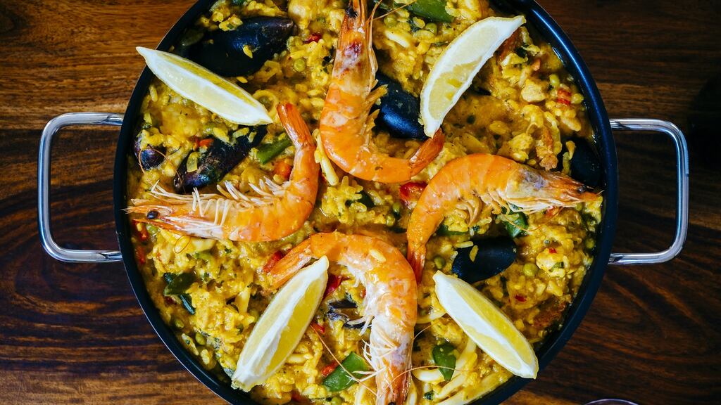 Authentic paella is made with seafood, though chicken and chorizo versions have become popular