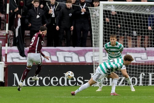 Hearts comprehensively beat Celtic to go eight points clear at top of Scottish Premiership
