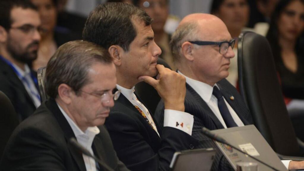 Ecuador’s president Rafael Correa (centre), flanked by Argentina’s foreign minister Hector Timerman (right) and Ecuador’s foreign minister Ricardo Patino, attend yesterday’s presidential meeting in Cochabamba. Photograph: Danilo Balderrama/Reuters