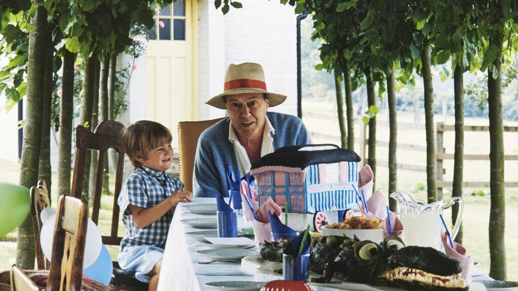 Author Roald Dahl circa 1989 with his grandson Luke Kelly, who is now the managing director of the Roald Dahl Literary Estate. Photograph: Jan Baldwin via The New York Time
