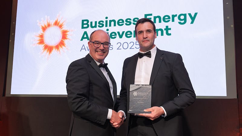 Xavier Dubuisson, awards judge, presents the best energy achievement in retail to Peter Kennedy, Tesco Ireland