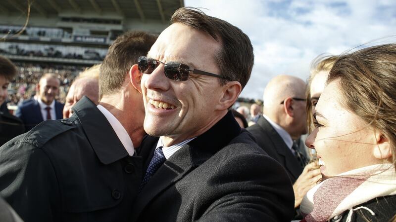 Aidan O’Brien celebrates after Saxon Warrior gave him a 26th Group One win of the year. Photograph: Alan Crowhurst/Getty