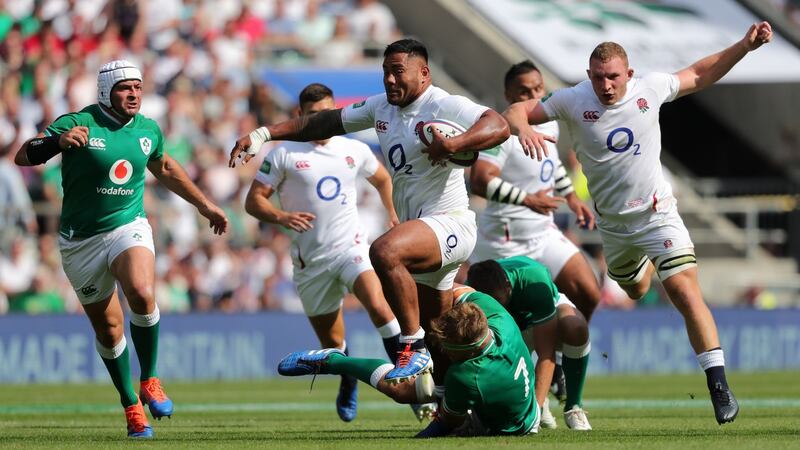 Manu Tuilagi carries for England against Ireland. Photograph: Mike Hewitt/Getty