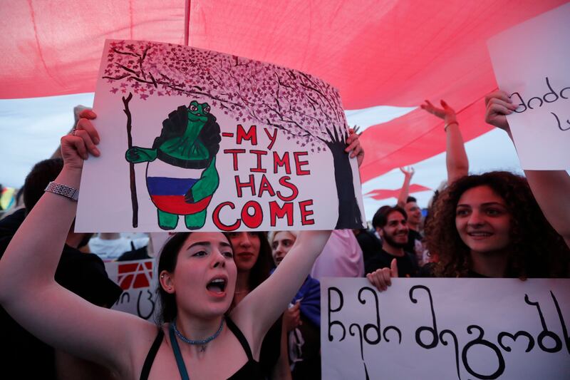 People attend a rally in support of Georgia's membership of the European Union in Tbilisi in July last year. Photograph: Zurab Kurtsikidze/EPA