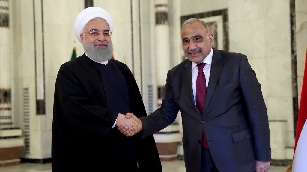 Close ties: Iraq’s prime minister Adel Abdul Mahdi with Iranian president Hassan Rouhani in Baghdad. Photograph: EPA/Ahmed Jalil