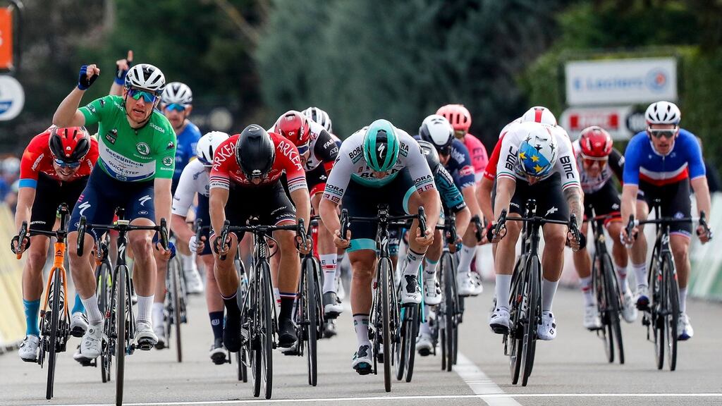 Ireland’s Sam Bennett celebrates as he crosses the finish line to win stage 5 of the Paris-Nice race between Vienne and Bollene. Photograph: Bas Czerwinski/AFP via Getty Images
