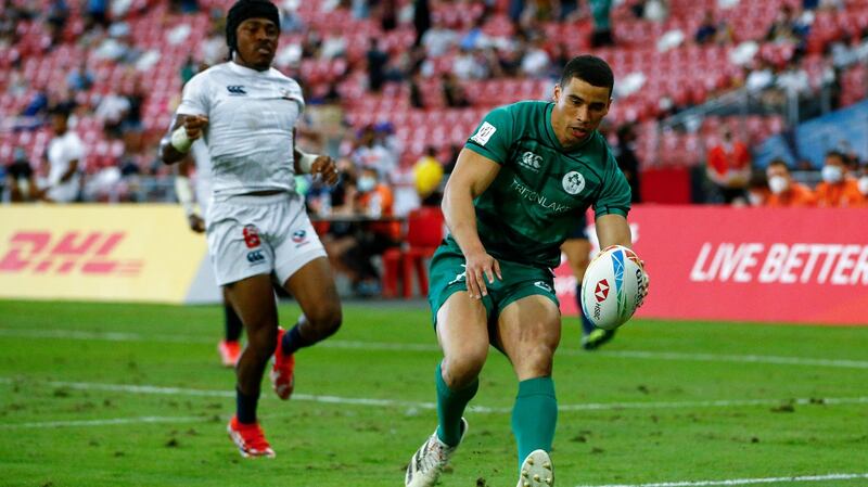 Ireland’s Jordan Conroy scores a try against Fiji in Singapore. Photograph: Martin Seras Lima/Inpho