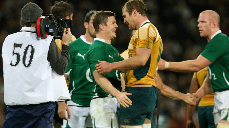 Former Leinster teammates Brian O’Driscoll and Rocky Elsom share a joke after an Ireland v Australia international in November 2009. Photograph: James Crombie/Inpho
